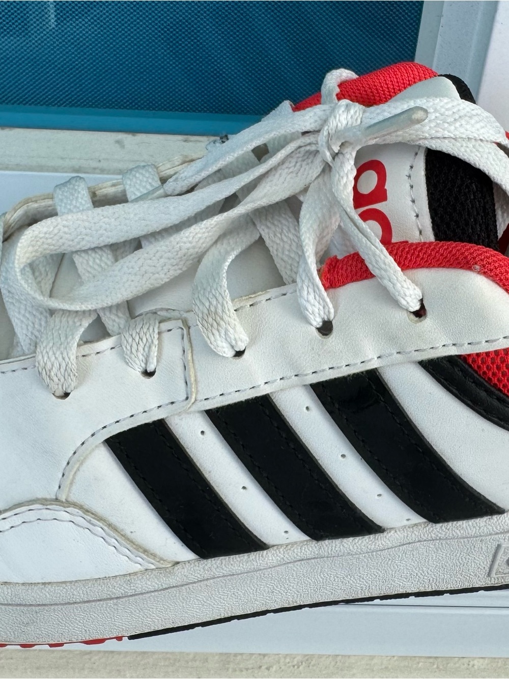 adidas White Sneakers with Black Stripes and Red Accents